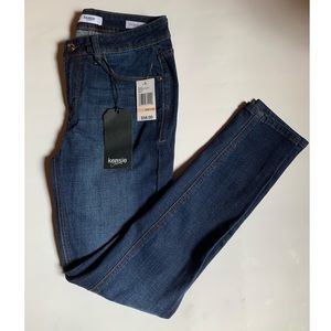 New dark wash denim jeans.